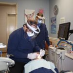 Dr. Youseph Kassar examines patient Larry Du